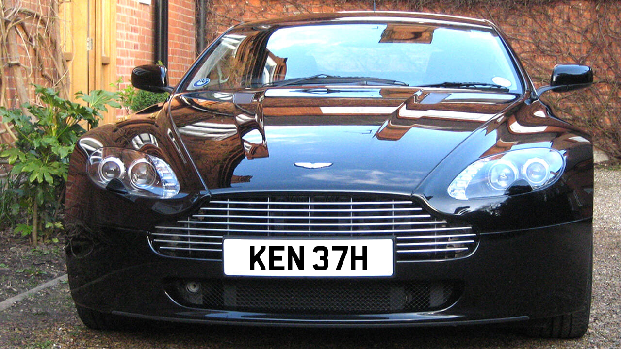 Aston Martin car with a Kenneth number plate displayed on it