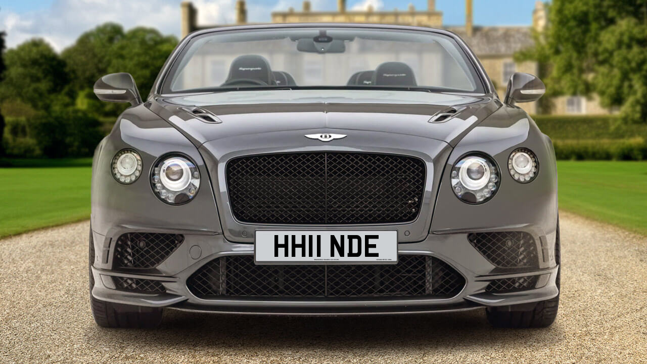 Car displaying the registration mark HH11 NDE